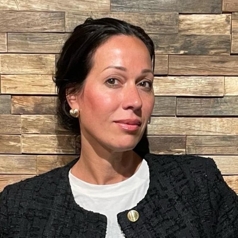 Portrait of a Room108 store employee representing friendly and professional customer service.