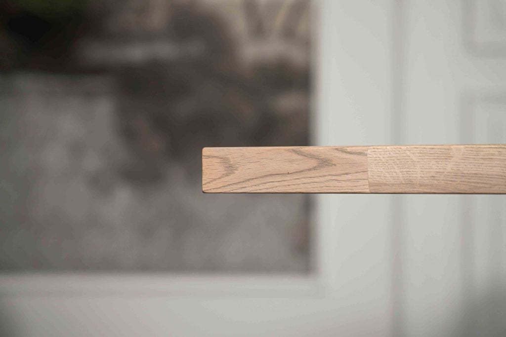 The Nice semi-oval dining table with a tapered spider leg from Room108