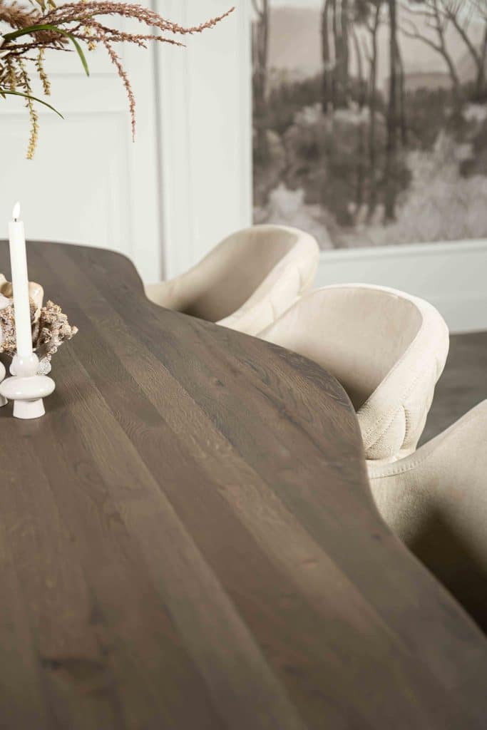 St. Tropez organic-shaped dining table in dark brown with matching leg from Room 108