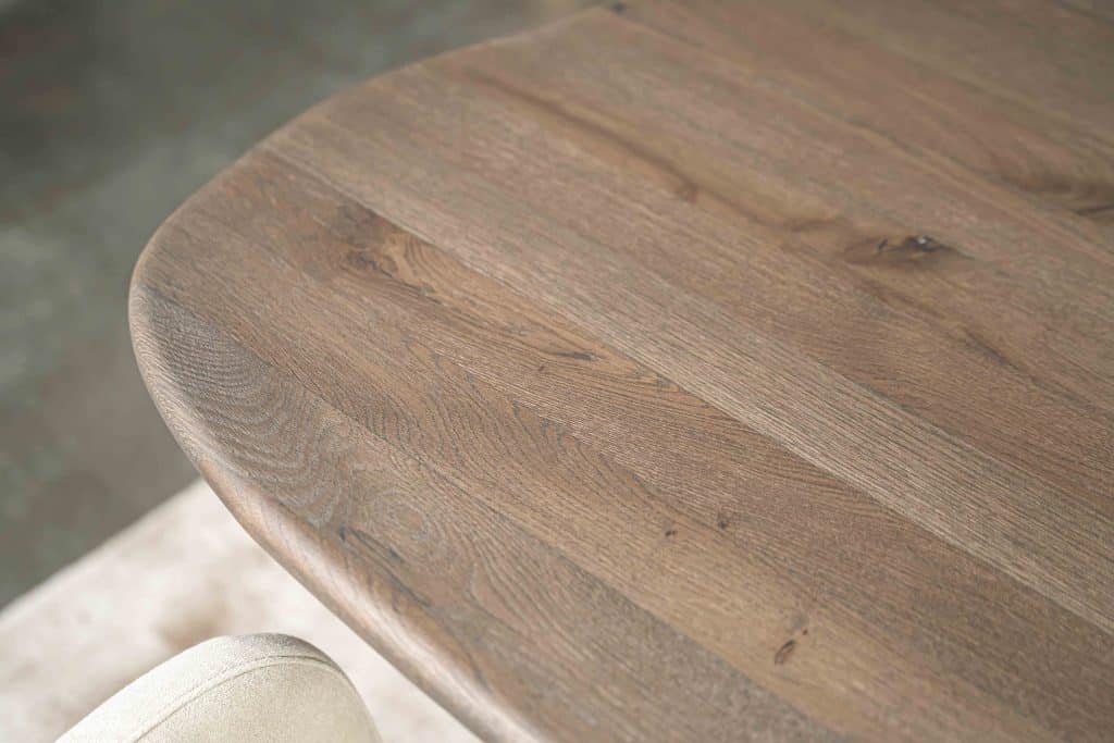 St. Tropez organic-shaped dining table in dark brown with matching leg from Room 108