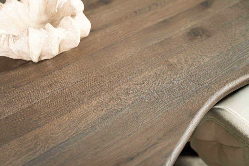 St. Tropez organic-shaped dining table in dark brown with matching leg from Room 108