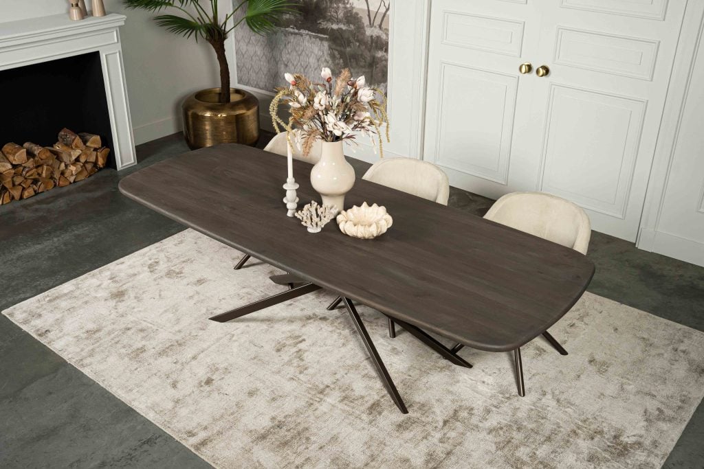 The Danish oval slim dining table Bordeaux with metal mikado leg from Room108.