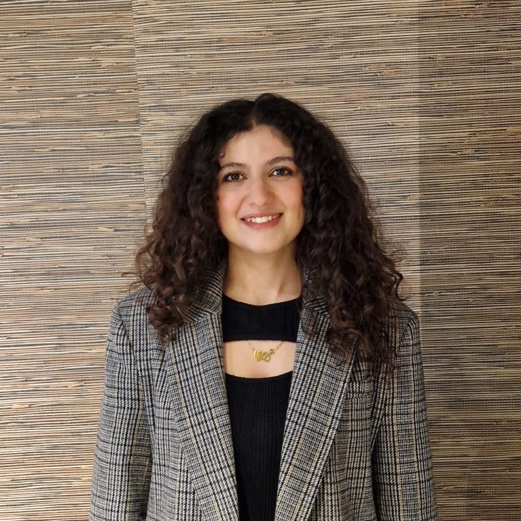 Portrait of a Room108 store employee representing friendly and professional customer service.