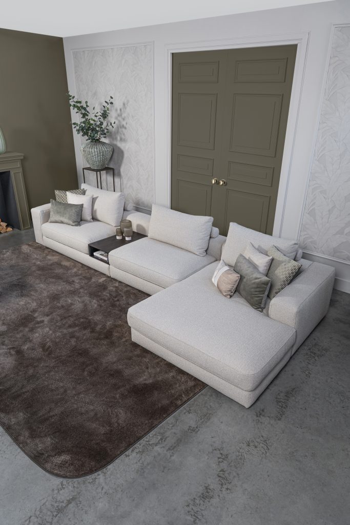 Lichte modulaire elementenbank Eva met innerbench en zachte kussens, gestyled met accessoires in een modern interieur.